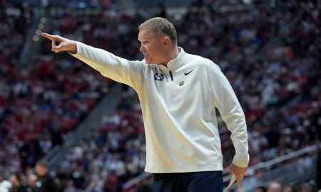 Mar 22, 2026; San Diego, CA, USA; Utah State Aggies head coach Jerrod Calhoun reacts in the first half against the Arizona Wildcats during a second round game of the men's 2026 NCAA Tournament at Viejas Arena. Mandatory Credit: Kirby Lee-Imagn Images