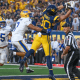 West Virginia wide receiver makes a catch against Pitt during the Backyard Brawl at Milan Puskar Stadium.