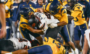 oklahoma state vs. west virginia caleb hawkins