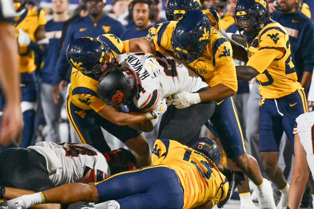 oklahoma state vs. west virginia caleb hawkins